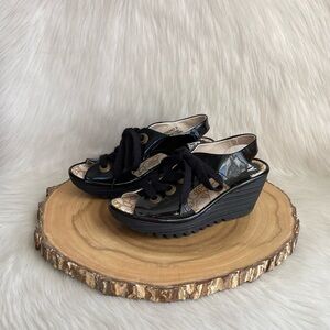 LIKE NEW Fly London black patent leather Yifa lace wedge sandals EU 36